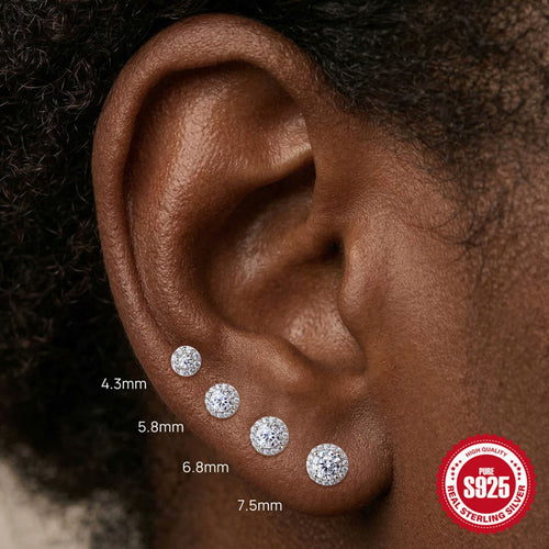 Close-up of an ear with diamond earrings and size measurements, featuring a 925 silver stamp.