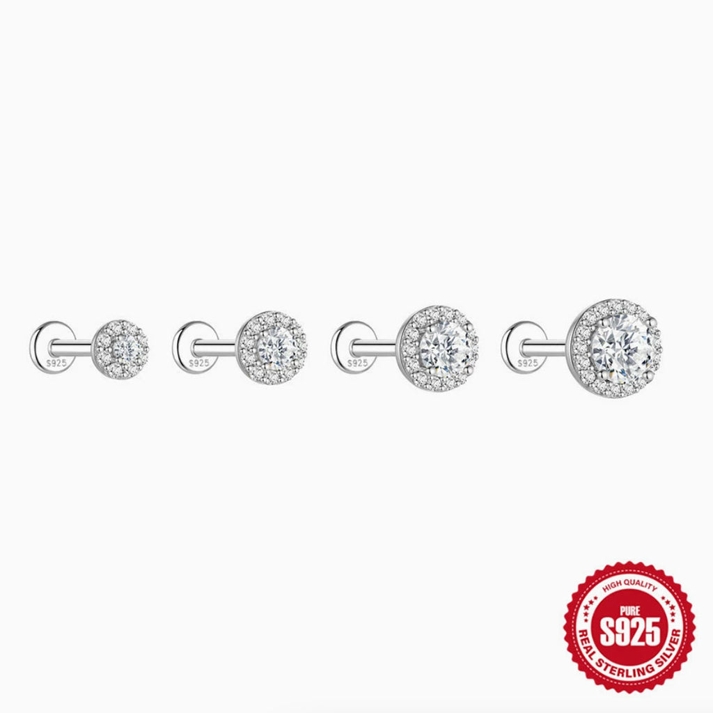 Pair of silver earrings with clear gemstones on a white background, featuring a '925 Sterling Silver' stamp.